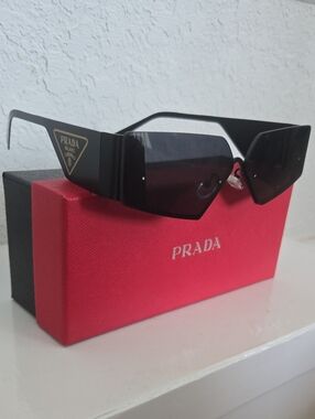 2 Pair Of Sunglasses